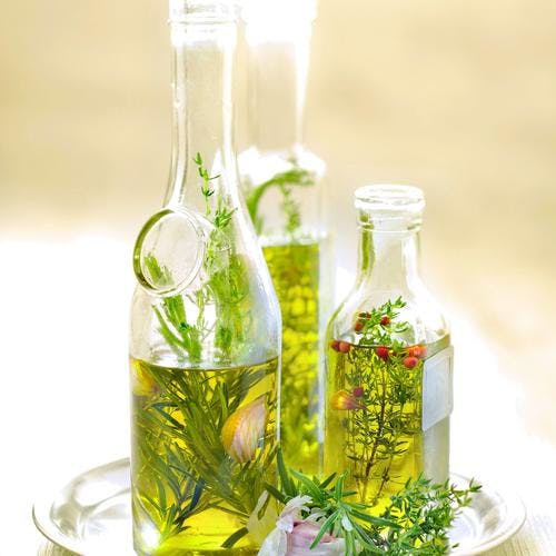 Huile d'olive aromatisée au thym et romarin 