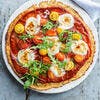 Pizza à la pâte de chou-fleur, tomates cerises et mozzarella